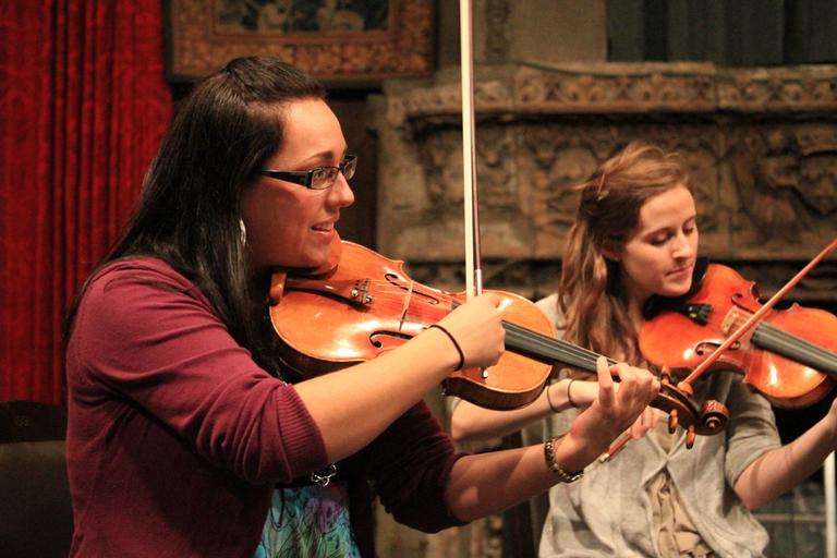 Ivonne Hernandez, a founding member of "Chambergrass," plays the violin. (Jeff Carpenter for WBUR)