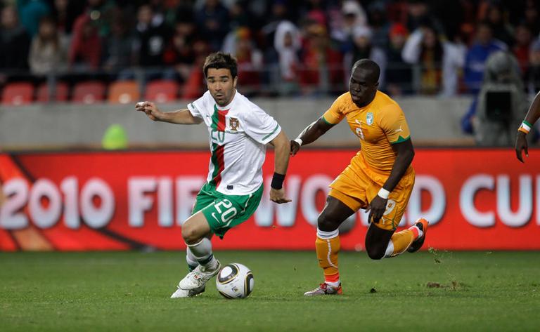 Portugal's Deco, left, and Ivory Coast's Cheick Tiote during their World Cup Group G match on Tuesday. The match ended 0-0 to the consternation of many watchers. (AP)