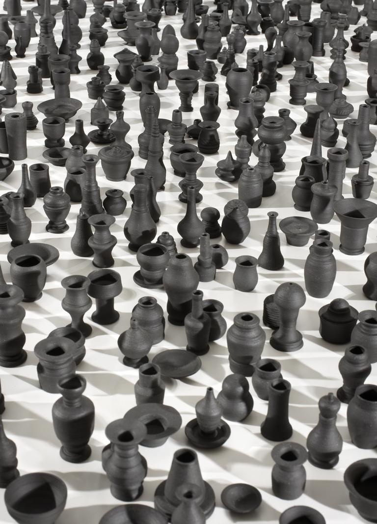 Charles LeDray, Throwing Shadows, 2008–2010, Black porcelain, Dimensions variable, Courtesy of the artist and Sperone Westwater, New York, Photo: Tom Powel. Courtesy of Sperone Westwater