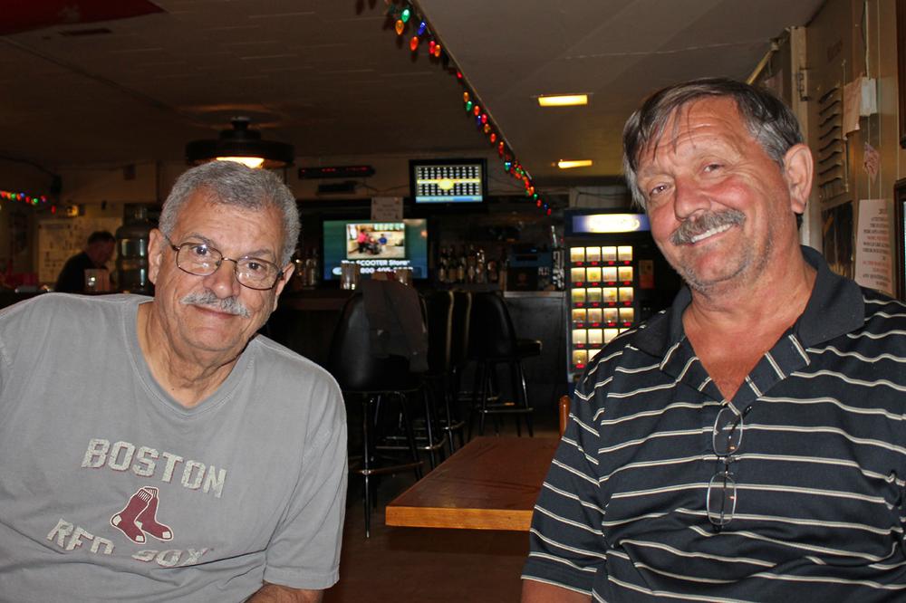 Rob Patalano and Bob Hardy, right, work hard to recruit young veterans into the George Dilboy VFW post in Somerville. (Lisa Tobin/WBUR) 