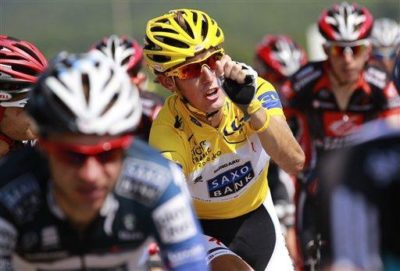 Andy Schleck of Luxembourg, wearing the overall leader's yellow jersey, rides in the pack during the 11th stage of the Tour de France Thursday, July 15, 2010. (AP Photo/Bas Czerwinski)