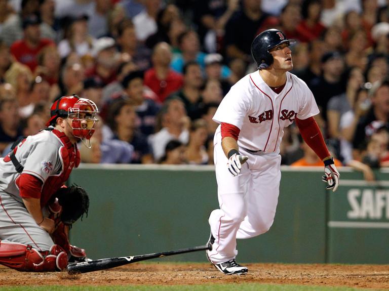 Boston Red Sox's Ryan Kalish and Los Angeles Angels catcher Bobby Wilson watch Kalish's grand slam during the fourth inning of a baseball game at Fenway Park in Boston on Tuesday. (AP)