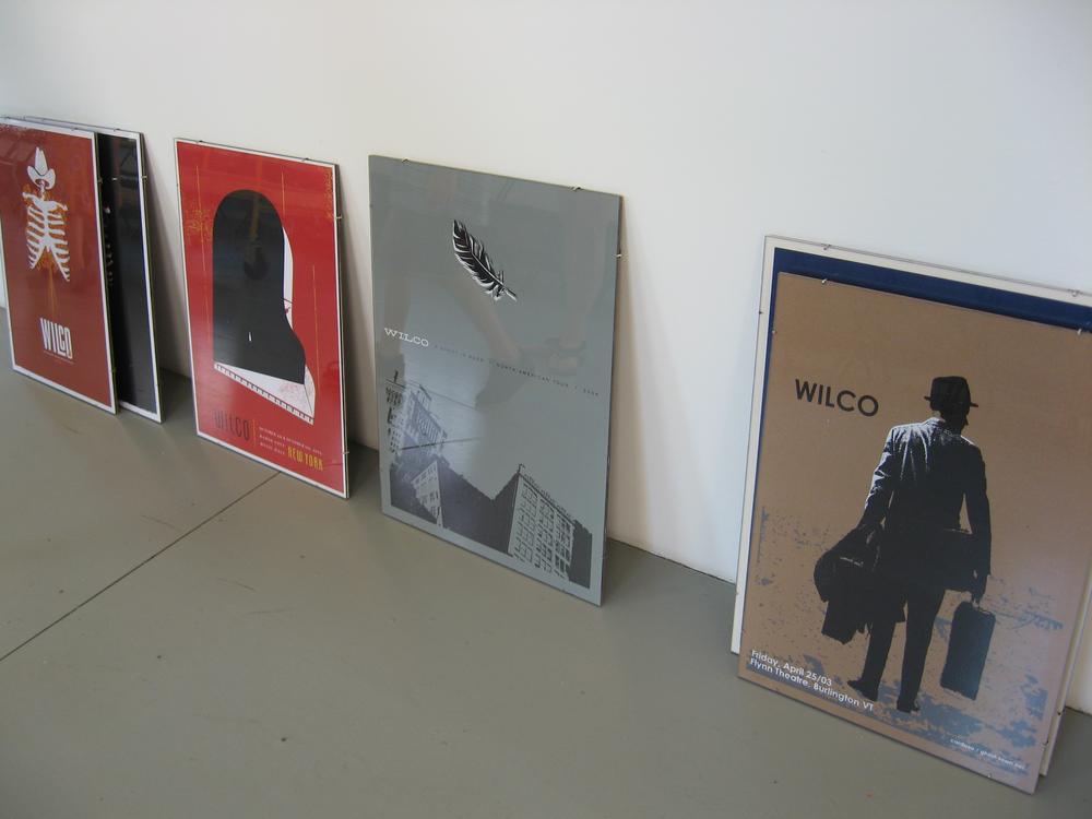 Wilco posters wait to be hung in MASS MoCA. (Andrea Shea/WBUR)