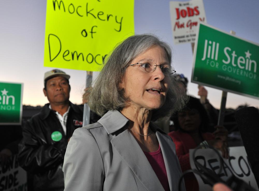 Gubernatorial candidate Jill Stein of the Green-Rainbow Party speaks to a reporter after she was excluded from a gubernatorial debate in Braintree on Tuesday. (AP)