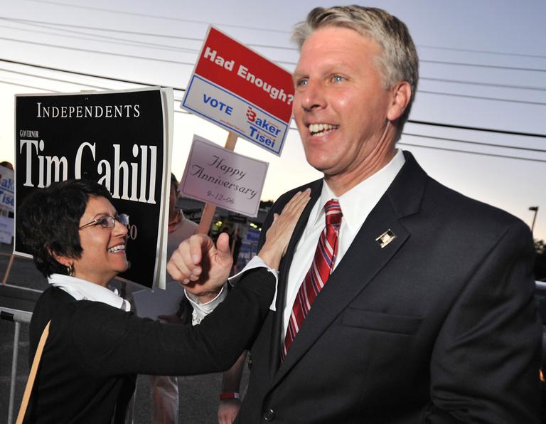 Independent candidate for governor Timothy Cahill meets a supporter on his way into a debate in Braintree on Sept. 14. (AP)