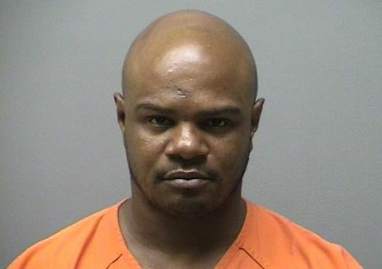 Kiamani Washington, 35, is charged with unlawful possession of a firearm and receiving stolen property, including the vehicle police said was used in connection with the murders. (Courtesy of the Manchester, N.H., Police Department)