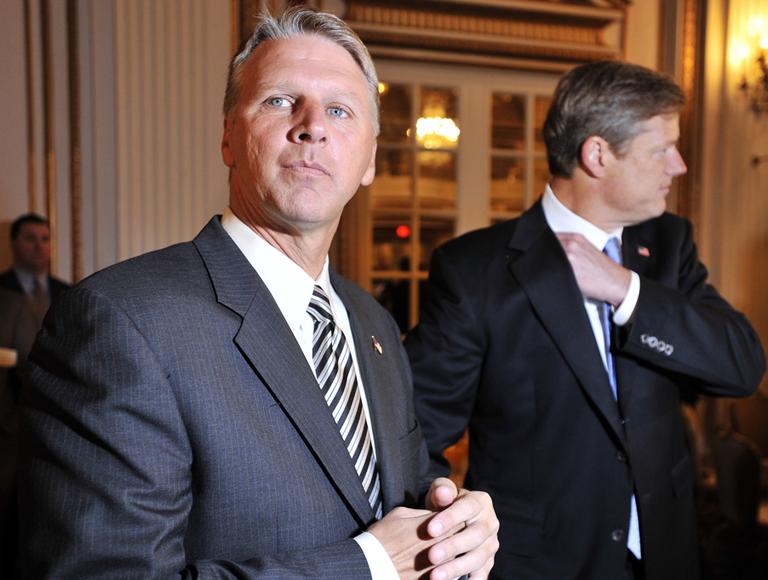State Treasurer Tim Cahill, left, running for governor as an Independent, and Republican Charles Baker wait to take the stage for a gubernatorial debate in Boston, Wednesday. (AP)