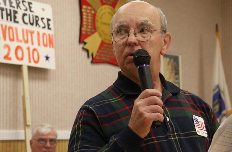 Tedd Tripp, a retired chemical engineer from North Andover, speaks at a Merrimack Valley Tea Party meeting. Tripp says the tax rollback is absolutely practical. (Kirk Carapezza for WBUR)