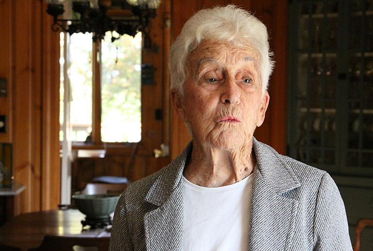 Alba Thompson, 92, an independent voter, was born and raised in Plymouth. She served under General Douglas MacArthur in Japan and then South Korea. In 1985, the retired teacher was elected Plymouth's first selectwoman. (Kirk Carapezza for WBUR)