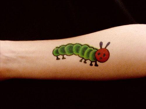Becky Quiroga with an image inspired by the children's book "The Very Hungry Caterpillar" by Eric Carle (from "The Word Made Flesh").