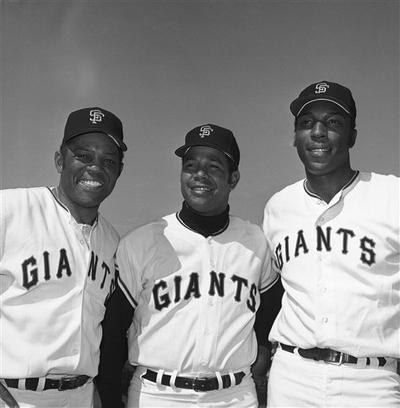 Giants greats Willie Mays, left, Juan Marichal, center, and Willie McCovey pose for a photo in 1970. (AP Photo)