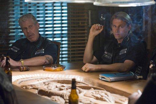 In this image released by FX channel, Ron Perlman, left, and Charlie Hunnam are shown in a scene from "Sons of Anarchy" on FX. (AP)
