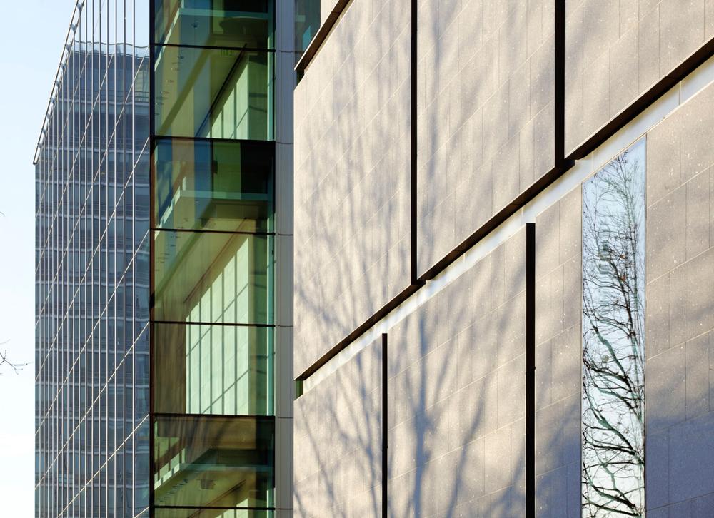 The glass and granite structure is four stories and 51,000 square feet. (Courtesy of Chuck Choi)