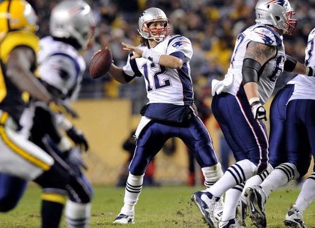 New England quarterback Tom Brady (12) drops back to pass during the fourth quarter of the game against Pittsburgh on Sunday in Pittsburgh. New England won 39-26.(AP)