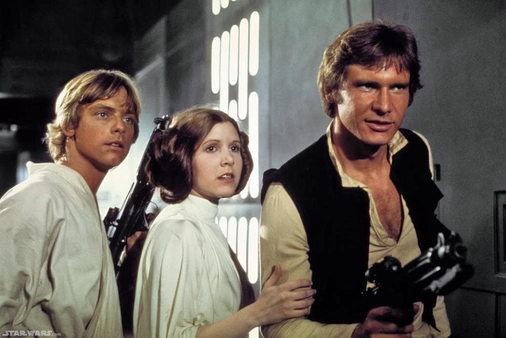 Mark Hamill, Carrie Fisher and Harrison Ford as Luke Skywaker, Princess Leia and Han Solo appear in a scene from "Star Wars."  (AP)
