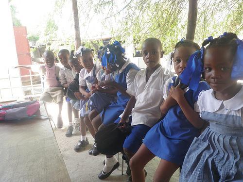 As cholera spreads through Port-au-Prince, Haitian schoolchildren are taught about the water-bourne illness and how to avoid it