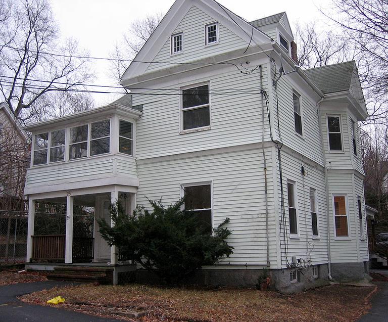 Solon and Familia had a $584,000 mortgage on this Hyde Park home. After it went into foreclosure, the bank auctioned it for $115,000. (Anthony Brooks for WBUR)