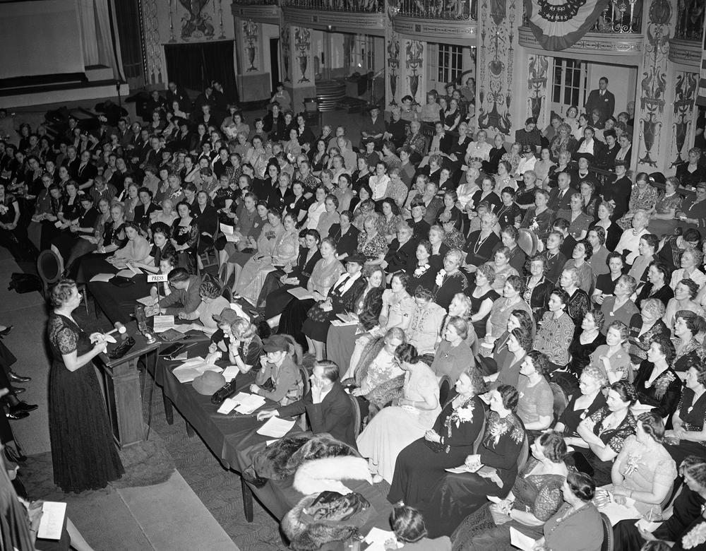 First Lady Eleanor Roosevelt addresses a National Defense Forum sponsored by the General Federation of Women's Clubs in Washington, D.C. Jan. 23, 1942. She urged that more women's groups take an interest in preventing congressional curtailment of National Youth Administration aid to college students. (AP)