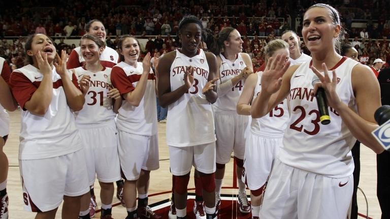 Stanford guard Jeanette Pohlen (23) addresses fans after Stanford defeated Connecticut 71-59 in an NCAA college basketball game Thursday night ending Connecticut's 90-game winning streak. (AP)