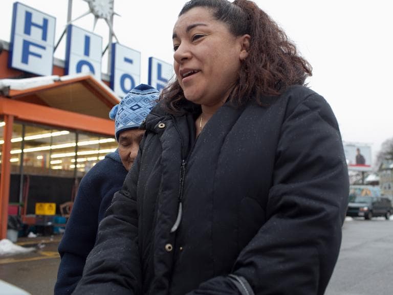 Shoppers outside of the Hi-Lo supermarket in Jamaica Plain (Nick Dynan for WBUR)