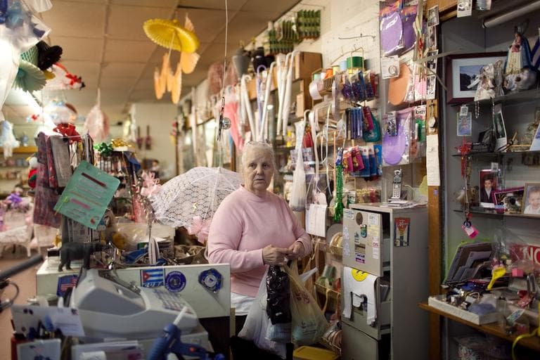 Gift shop owner Aida Lopez says her neighborhood has changed dramatically since she moved here from Cuba in 1970. (Nick Dynan for WBUR)