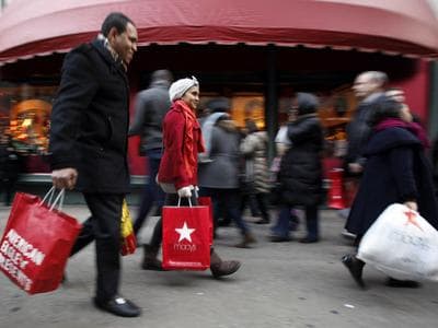 Americans boosted their spending at a 4.4 percent pace in the fourth quarter, the most since 2006. (AP)