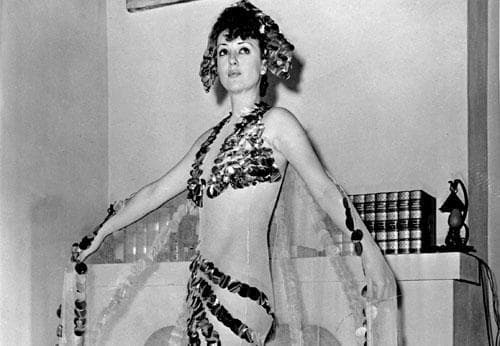 Gypsy Rose Lee, whose real name was Louise Hovick, shows off her costume, called 'Eclipse of the Sun.’ (AP)