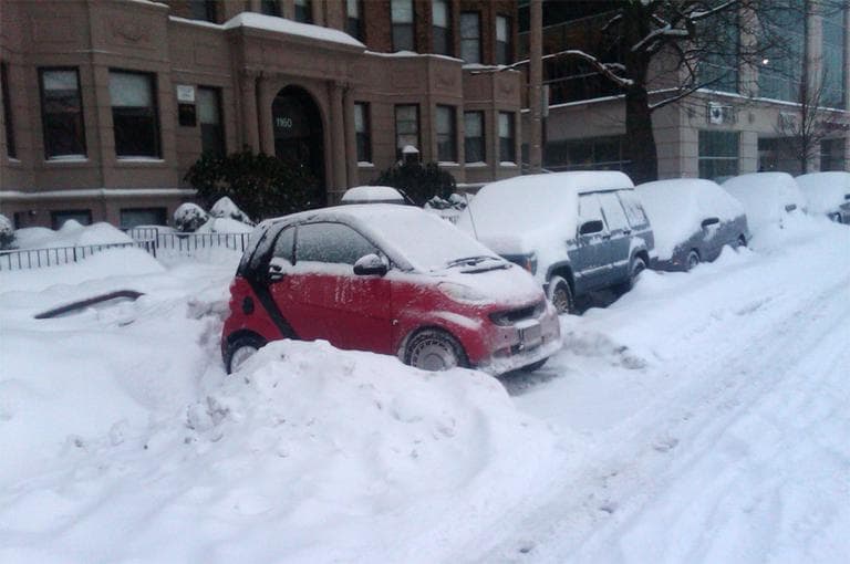 A smart car found a unique way to park in Brighton. (Kathleen McKenna/WBUR)