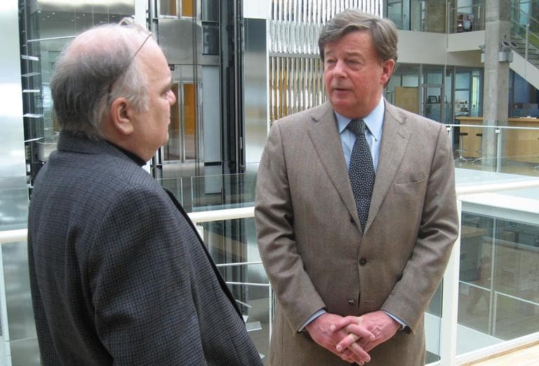 Henri Termeer speaks with WBUR's Bob Oakes at Genzyme headquarters Wednesday. (Lisa Tobin/WBUR)