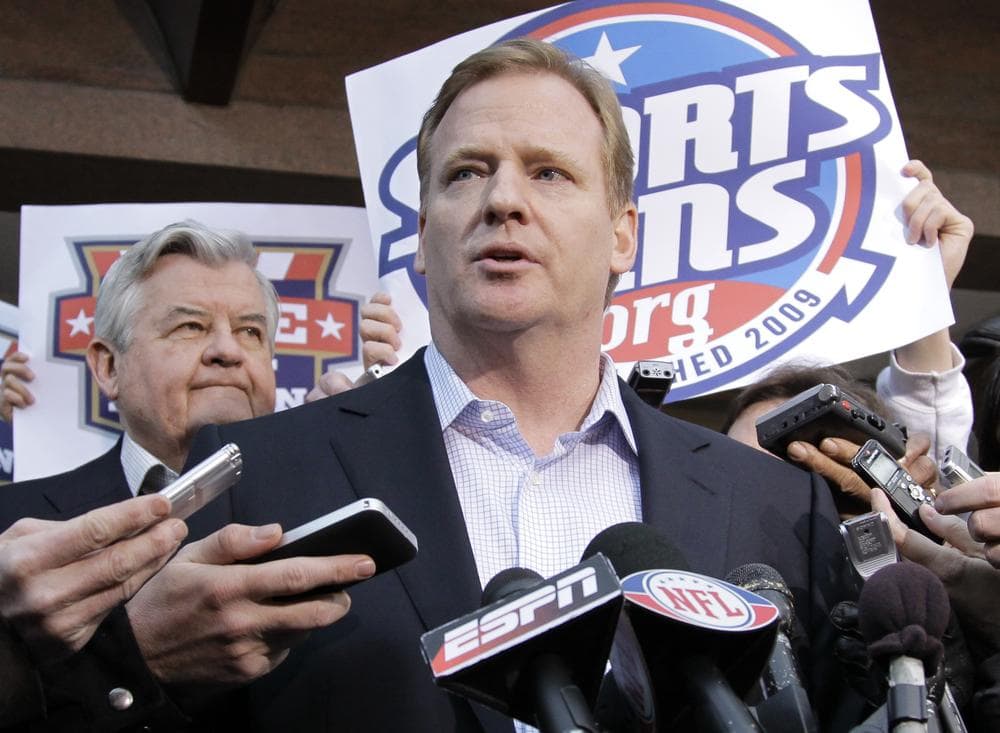 NFL Commissioner Roger Goodell, joined at left by Carolina Panthers owner Jerry Richardson, speaks with reporters as negotiations between the NFL owners and players go unresolved, at the Federal Mediation and Conciliation Service in Washington, Friday, March 11, 2011. (AP Photo/J. Scott Applewhite)