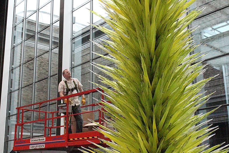 The sculpture is 42 feet tall, weighs 10,000 pounds, and is comprised of nearly 2,400 individual pieces of glass. (Andrea Shea/WBUR)