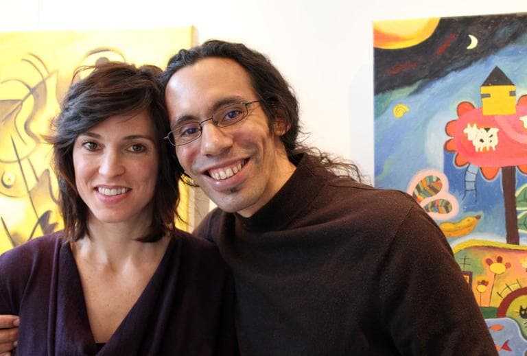 Artist Luis Rodriguez Noa, right, and Michelle Wojcik, La Galeria Cubana's director (Andrea Shea/WBUR)