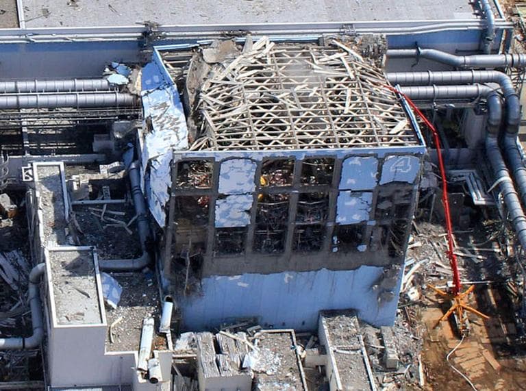 Prior to the quake, reactor 4's nuclear fuel rods had been transferred from the core to a spent fuel pool at the top of the building. Water cannons and concrete pumping trucks have been used in an attempt to keep the still-hot spent fuel rods submerged so they don't dangerously overheat. (Air Photo Service/AP)