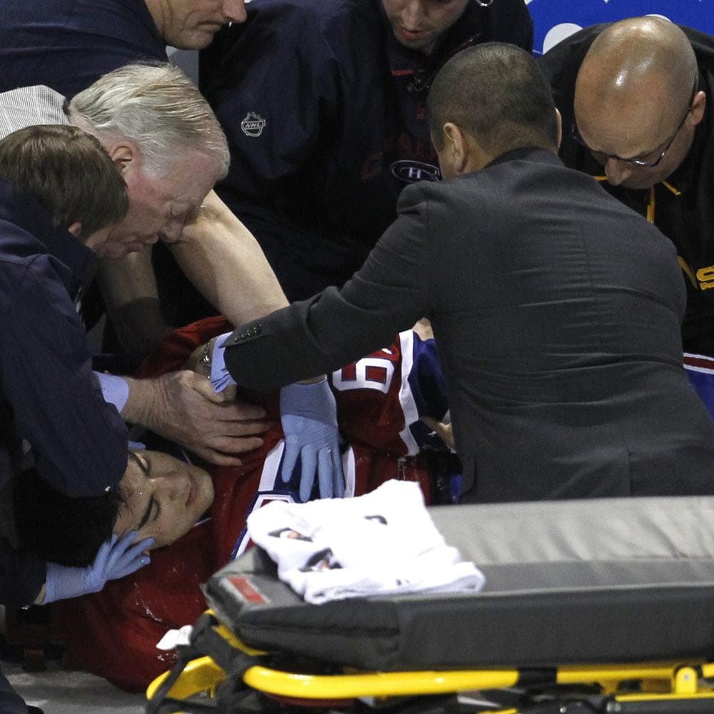 Montreal's Max Pacioretty had to be taken out on a stretcher Tuesday after a hit from Boston's Zdeno Chara. Pacioretty suffered a broken vertebra and a concussion. (AP)