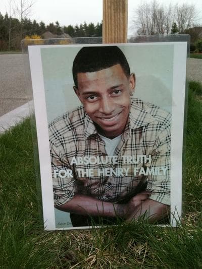 These signs are planted in the lawns of every house in the Henry family's Easton neighborhood. (Lisa Tobin/WBUR)