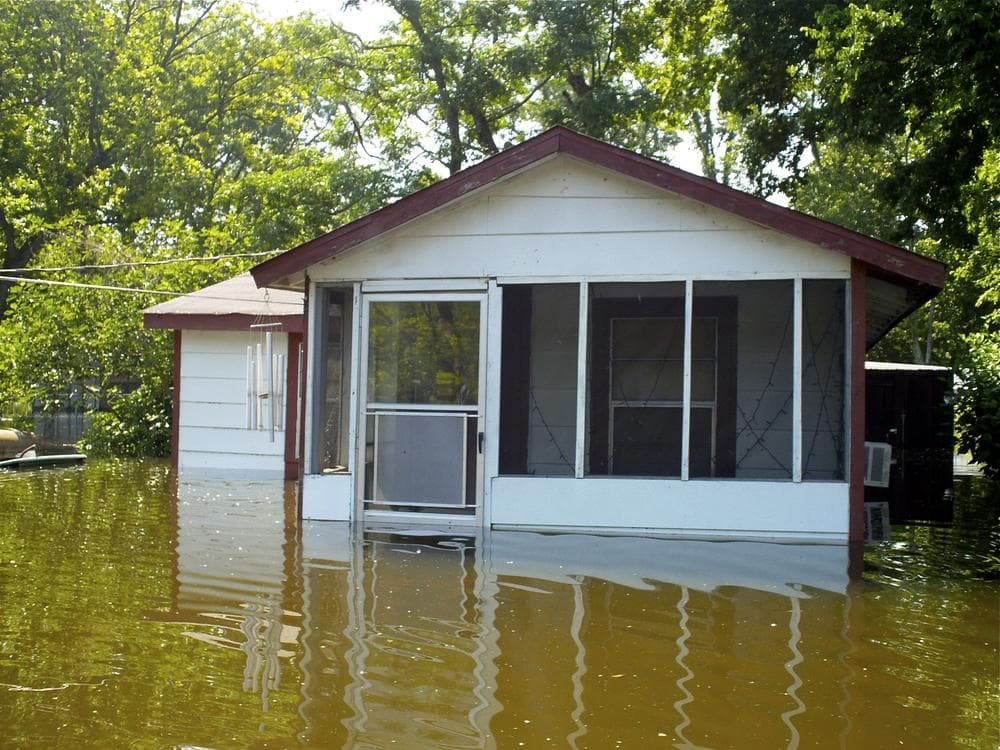 The flooded home of William Jefferson in Vicksburg, Miss., Tuesday. Jefferson said the water started coming into his house a few days ago. (AP)
