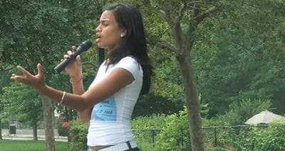 Beatriz Rivera is a youth activist. In this video still, she speaks in Jamaica Plain, where she grew up. (YouTube)