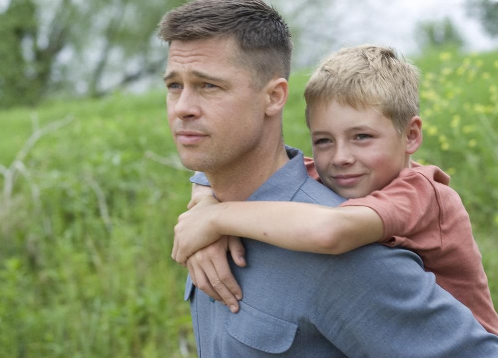 Actors Brad Pitt, left, and Laramie Eppler are shown in a scene from "The Tree of Life." (AP/Fox Searchlight)