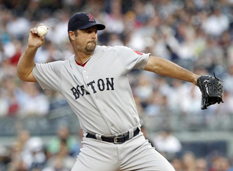 Boston Red Sox's Tim Wakefield delivers a pitch during the first inning at Yankee Stadium on Wednesday. (AP)