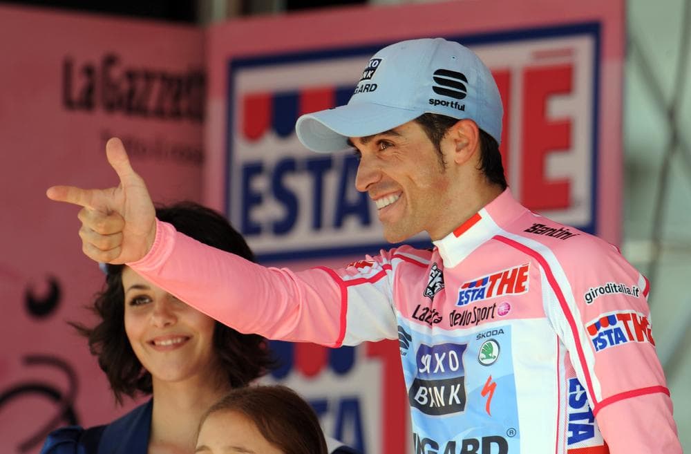 Alberto Contador celebrates after winning the 2011 Giro d'Italia. He's still defending himself against a positive test from the 2010 Tour de France. (AP)