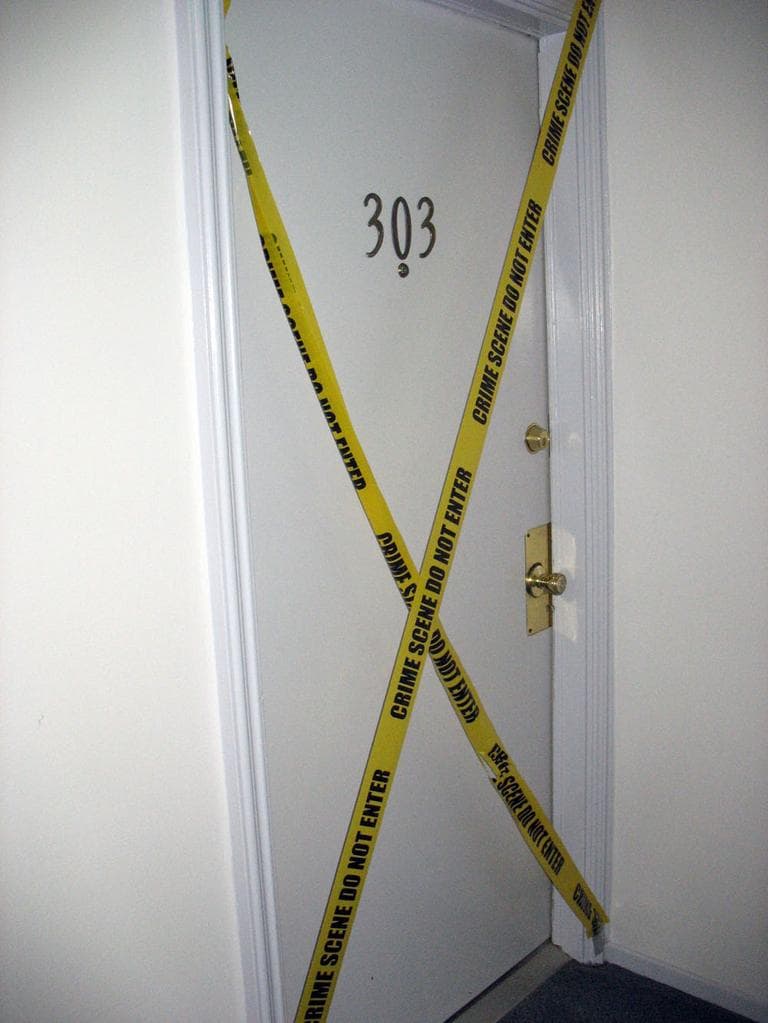The door to James "Whitey" Bulger and Catherine Greig's apartment in Santa Monica where they were living underground for 15 years, is now wrapped in police tape. (Monica Brady-Myerov/WBUR)