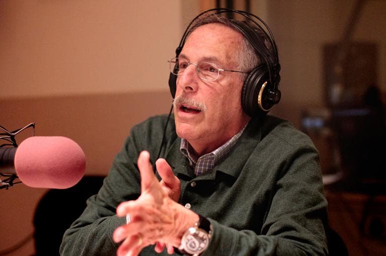 Nobel Prize winning economist Peter Diamond talks in the studio with Tom Ashbrook. (Jesse Costa/WBUR)