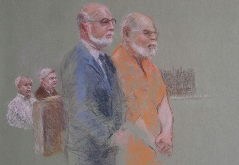 With his brothers John and William looking on, James "Whitey" Bulger enters not guilty pleas in federal court in Boston Wednesday. Bulger's attorney, J.W. Carney Jr., stands with his client. (Margaret Small for WBUR)