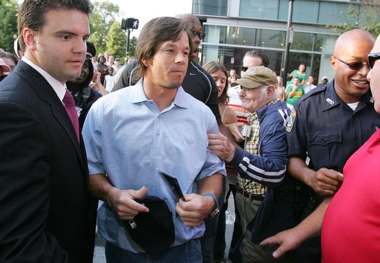 Actor Mark Wahlberg, second from left, arrives for the Boston premiere of the film 'Four Brothers' in 2005. (AP)