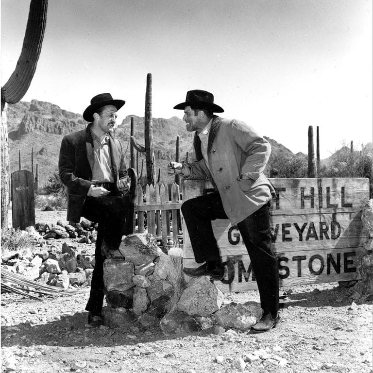 Co-stars Kirk Douglas, left, and Burt Lancaster talk between scenes on the set of the western "Gunfight at the O.K. Corral" in Hollywood, Ca., April 21, 1956. Lancaster plays the role of Wyatt Earp and Douglas portrays Doc Holliday. (AP)