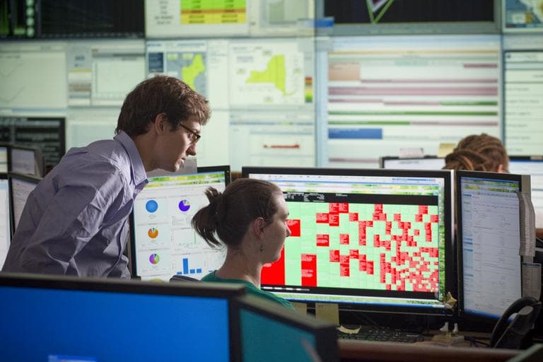 Workers in EnerNOC’s war room monitor demand for electricity in power grids across the country. (Courtesy EnerNOC)