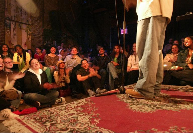 Andrew Tyree, a poet from St. Louis, Mo., performs during a competitive poetry slam at Nuyorican Poets Cafe in New York. (AP)