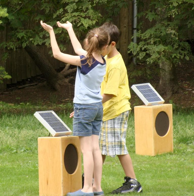 Students from the Massachusetts School of Science, Creativity and Leadership tested the "Sun Boxes" installation. (Courtesy deCordova)