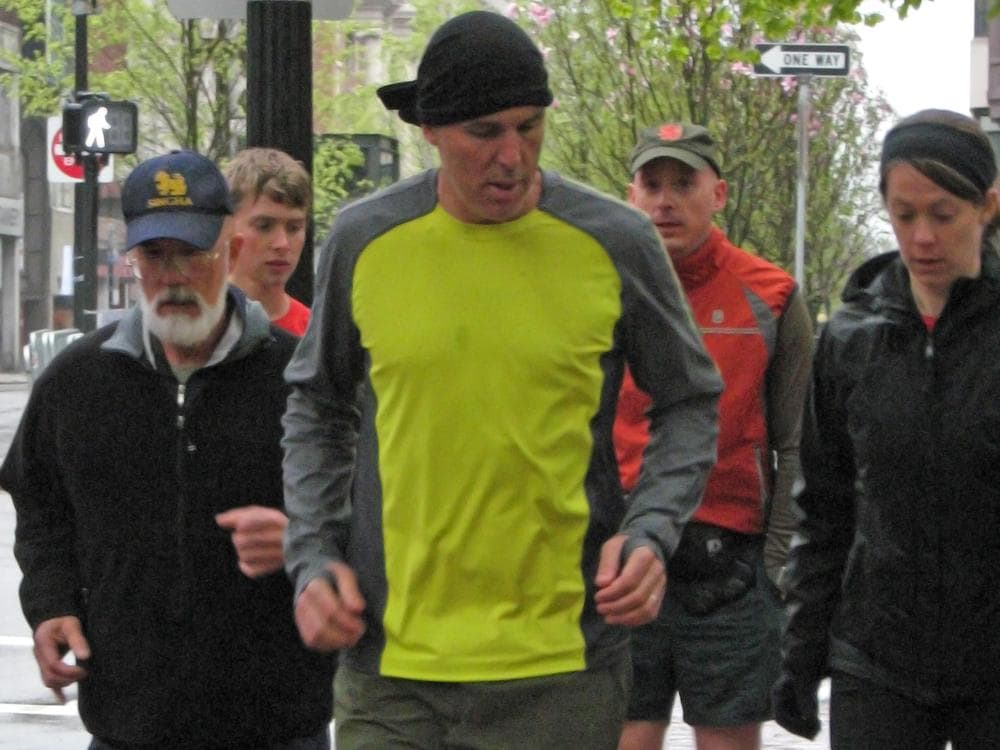 Christopher McDougall leads a barefoot running clinic on Boston Common in April of 2010. (Tyler Murray/WBUR)