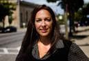 Nettie Fiorini, a 6th-grade special education teacher, stands in downtown Rochester, N.H. She hopes soon to open a Biker Café. (Jesse Costa/WBUR)